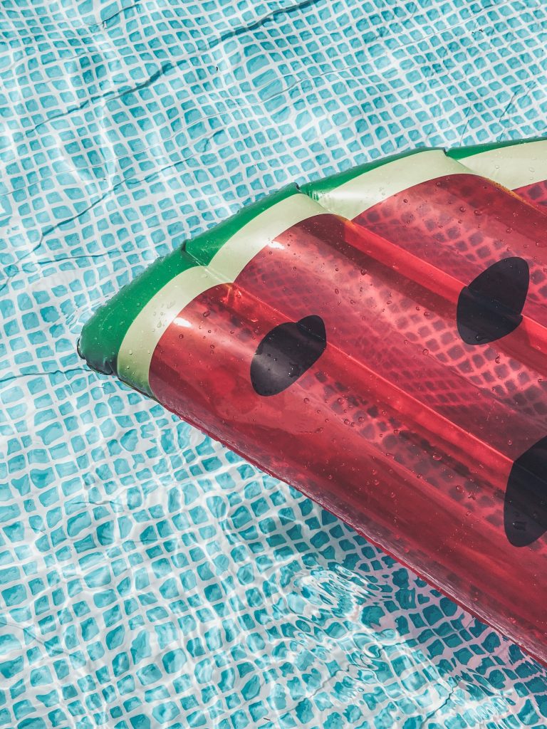 watermelon float in a swimming pool